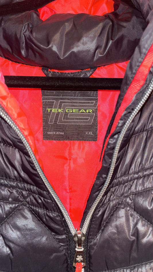 Tek Gear puffer vest label showing brand and XXL size