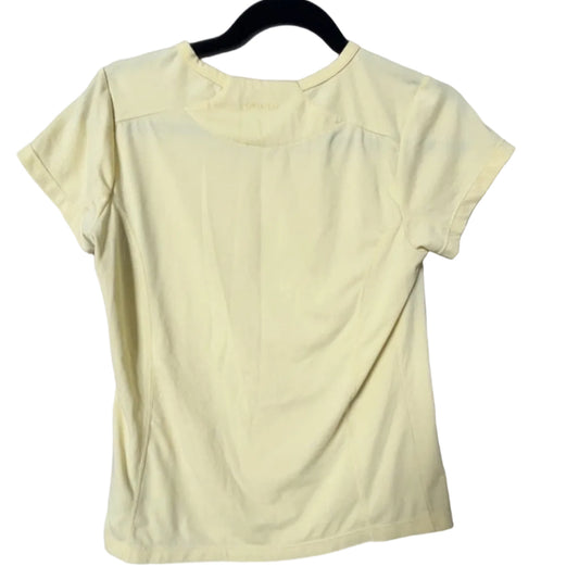 Columbia Titanium yellow tee back view showing mesh ventilation panel on shoulder