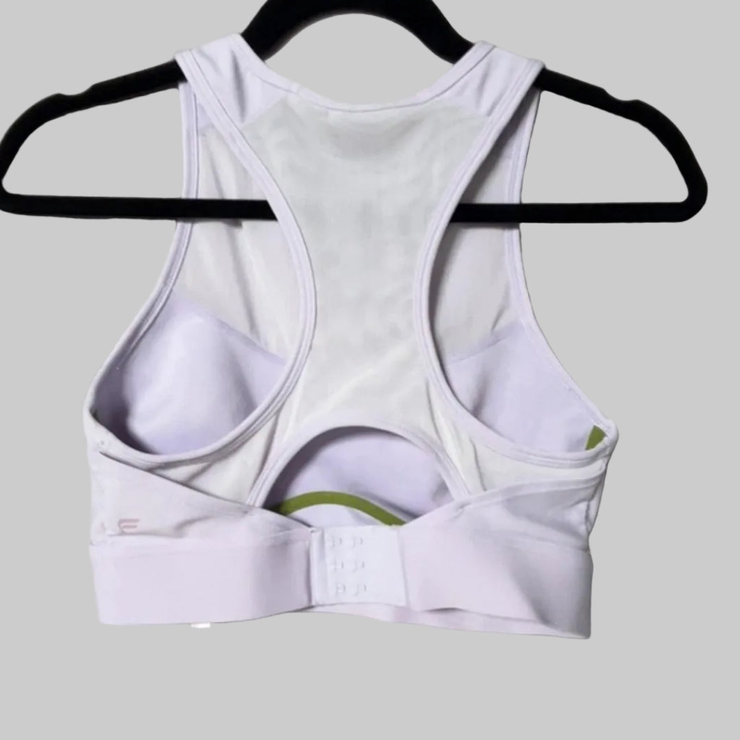 Fabletics white and olive sports bra back view showing racerback cutout, size Medium