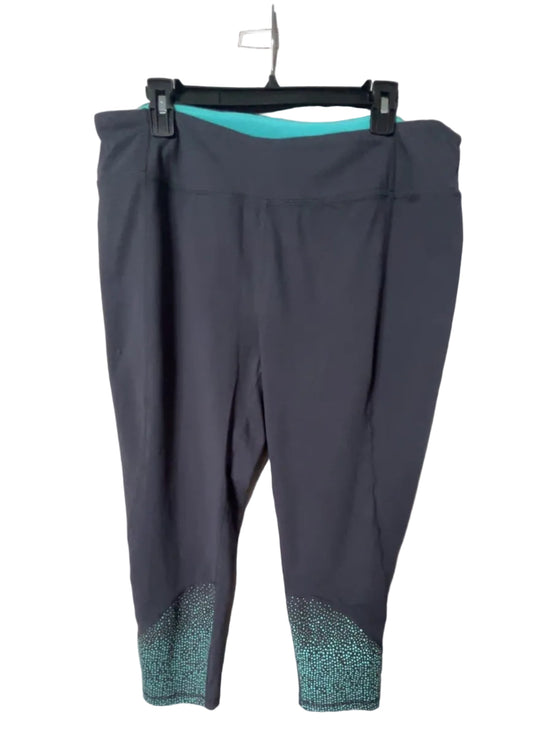 Grey and turquoise colorblock capri leggings front view with teal ankle detail, size 2X