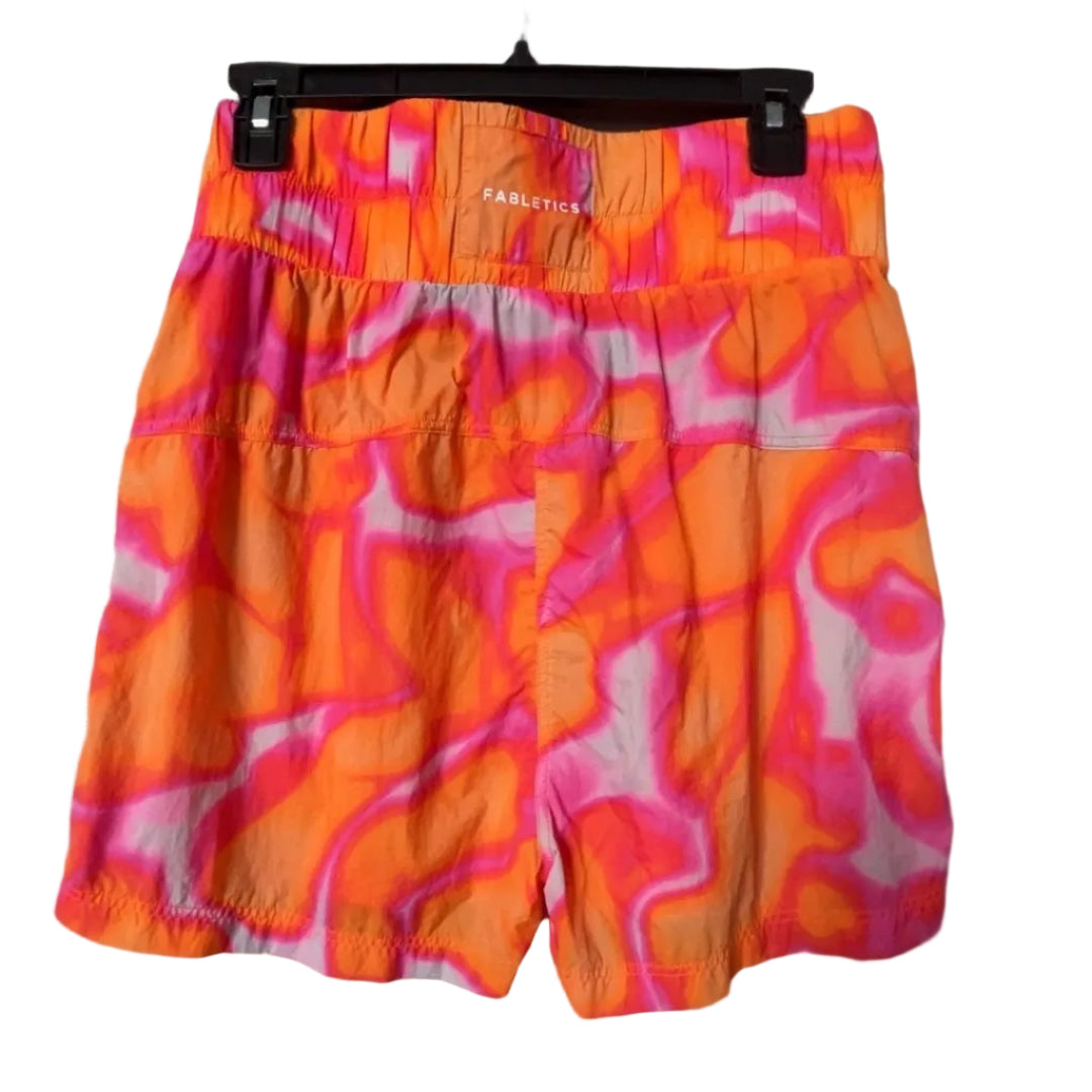 Fabletics orange pink swirl print running shorts back view showing Fabletics waistband logo, size Medium