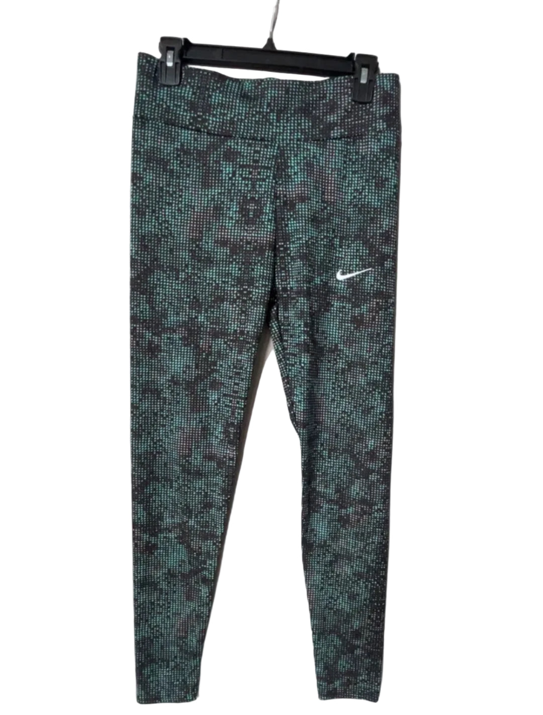 Nike iridescent teal dot print leggings front view with white swoosh, size Large