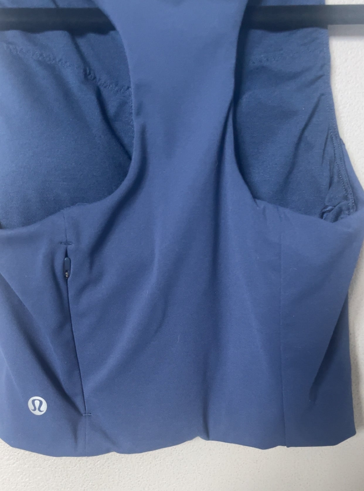 lululemon blue sports bra zip pocket detail