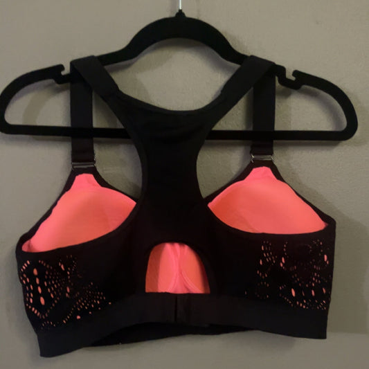 Yvette black and pink sports bra back view showing racerback and cups