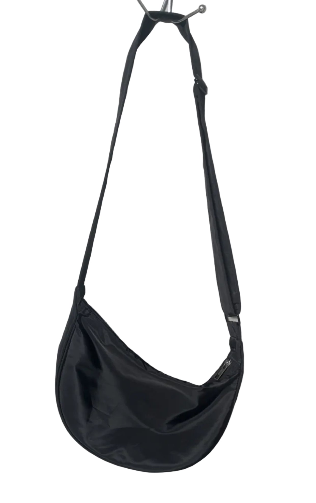 Black crescent sling bag with adjustable strap