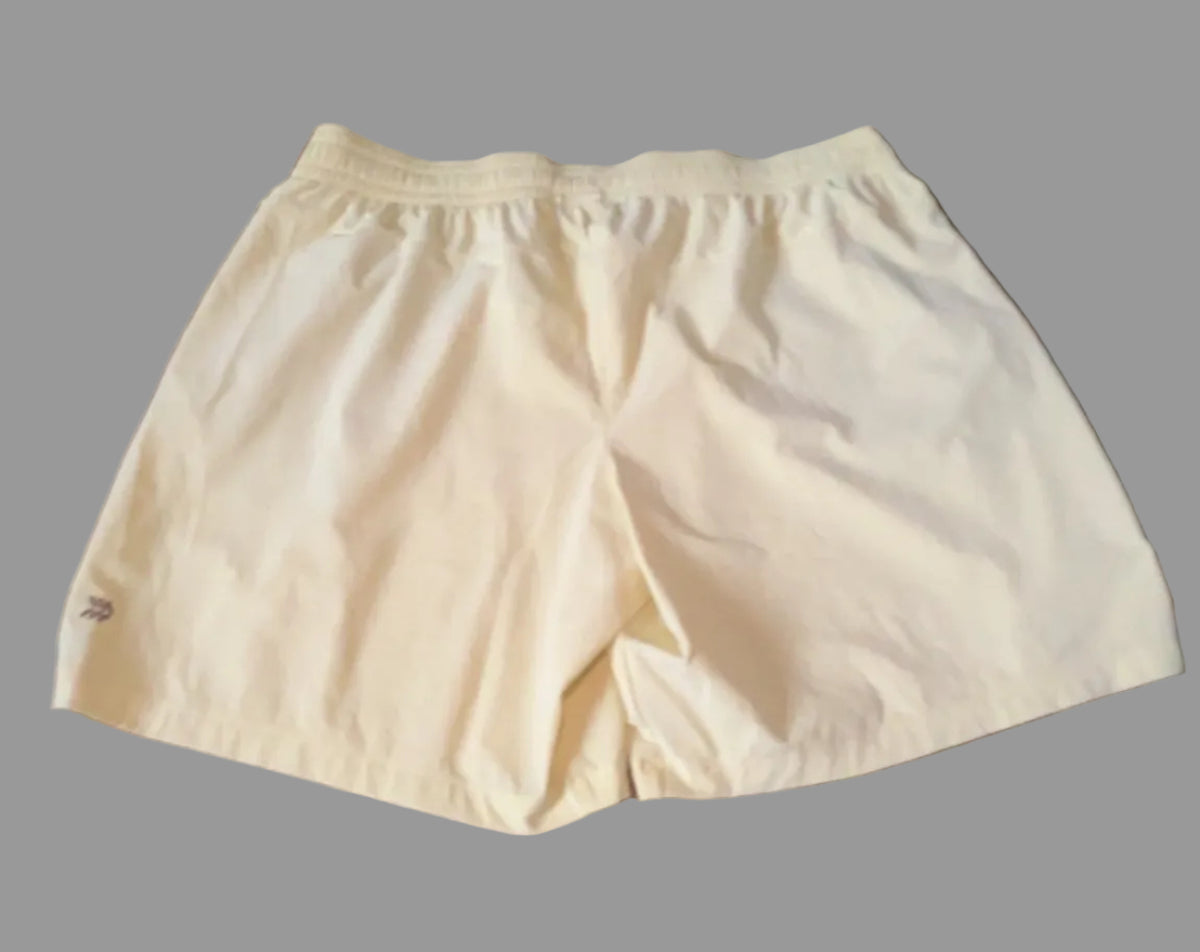 All in Motion athletic shorts interior label showing size Large