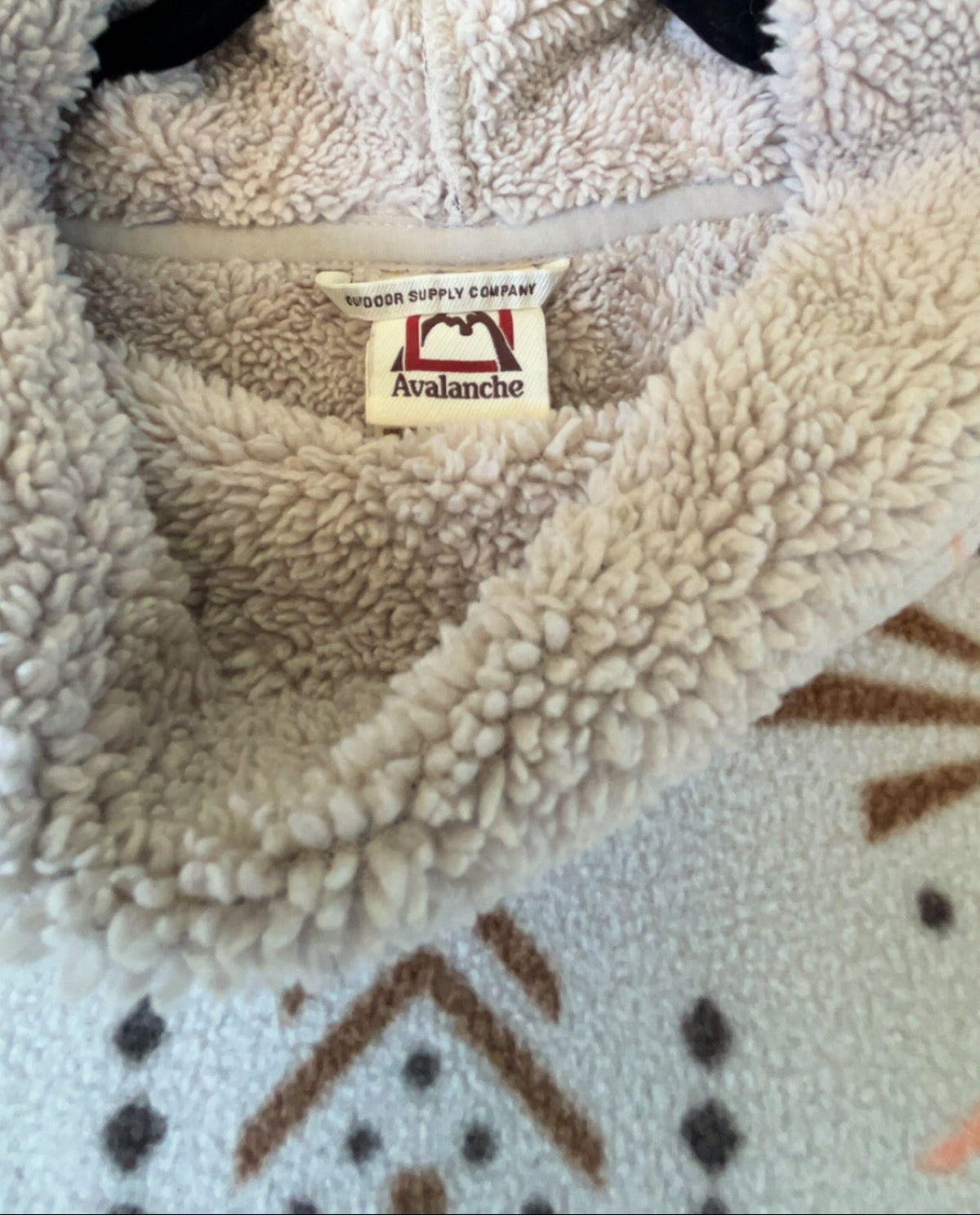 Avalanche label and soft sherpa-style lining on southwest print pullover