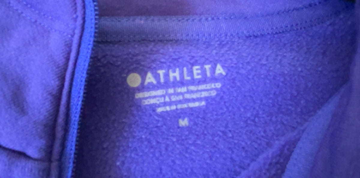 Back view of purple Athleta pullover, size Medium
