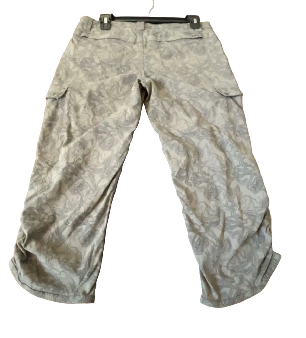 Back view of gray camouflage Browning hiking cargo capris with zipper pockets, size 4