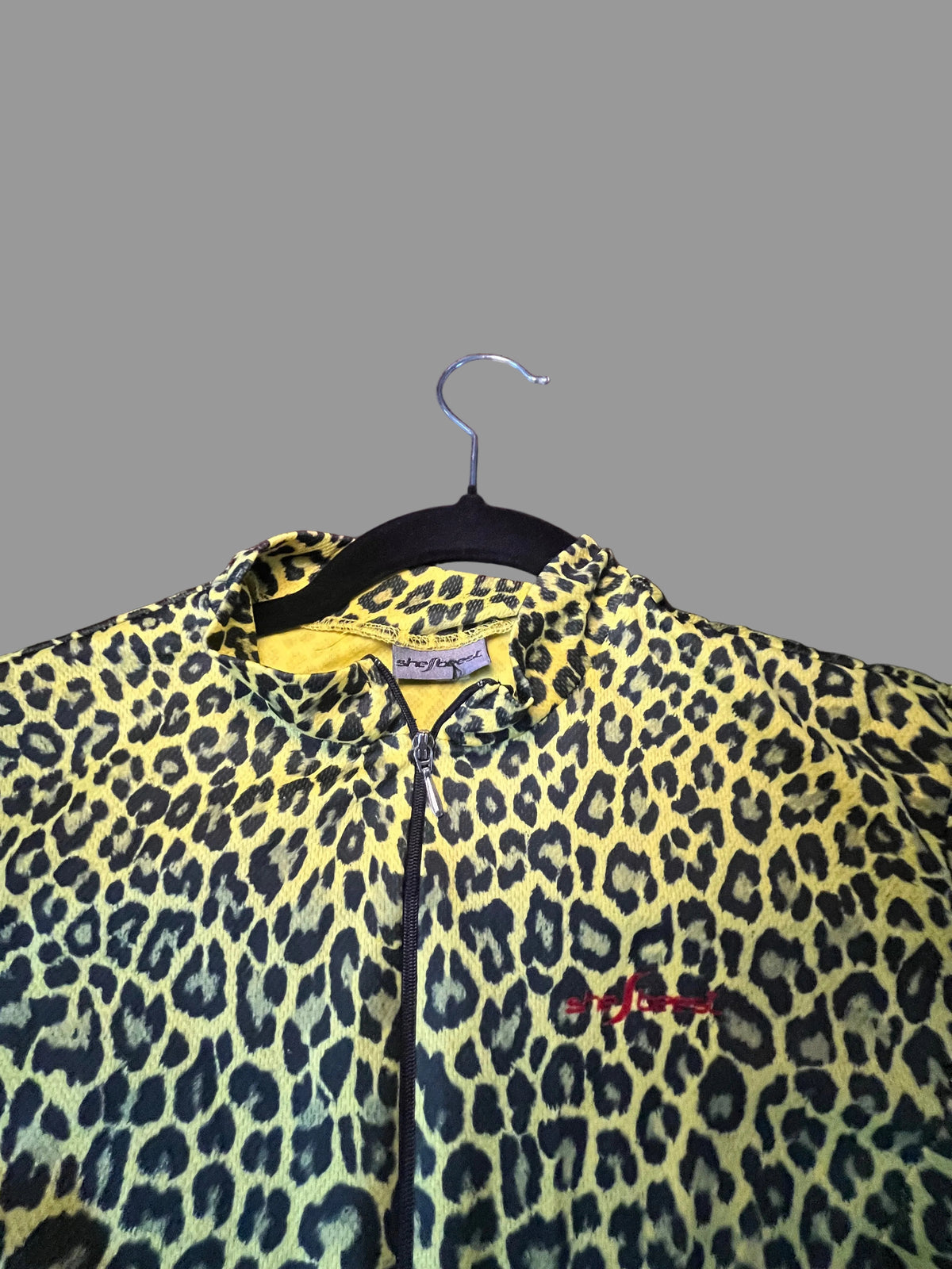 Back view of Shebeest leopard print cycling jersey