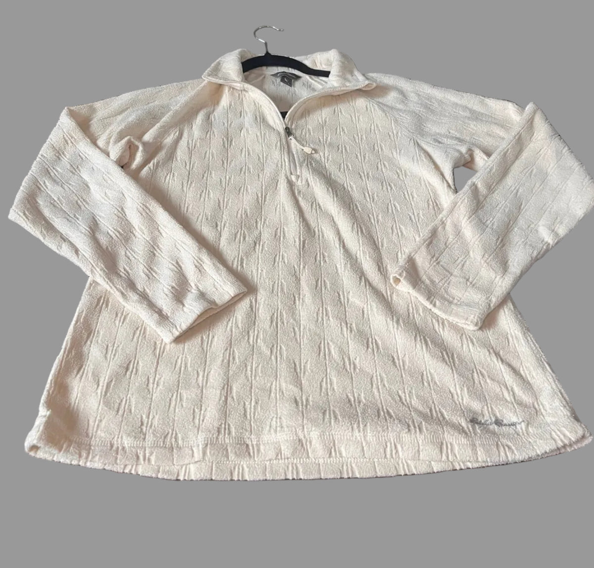 Front view of ivory Eddie Bauer textured quarter-zip pullover in size Small