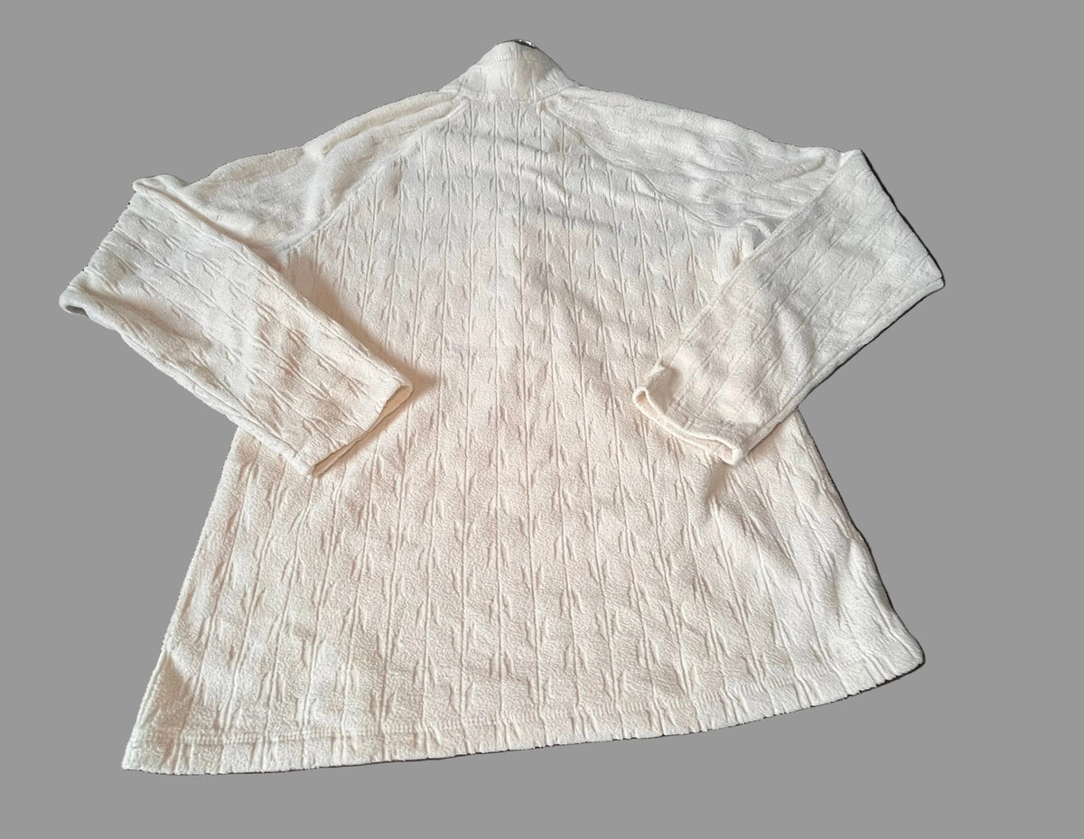 Eddie Bauer label showing women's size Small on textured pullover
