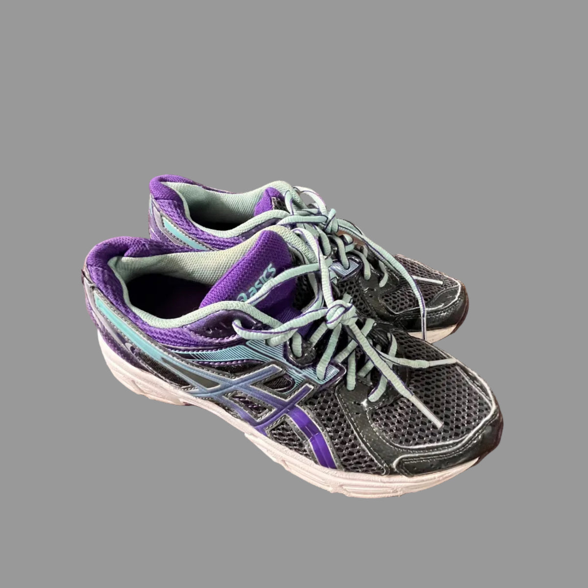 Outsoles of ASICS GEL-Contend 2 running shoes